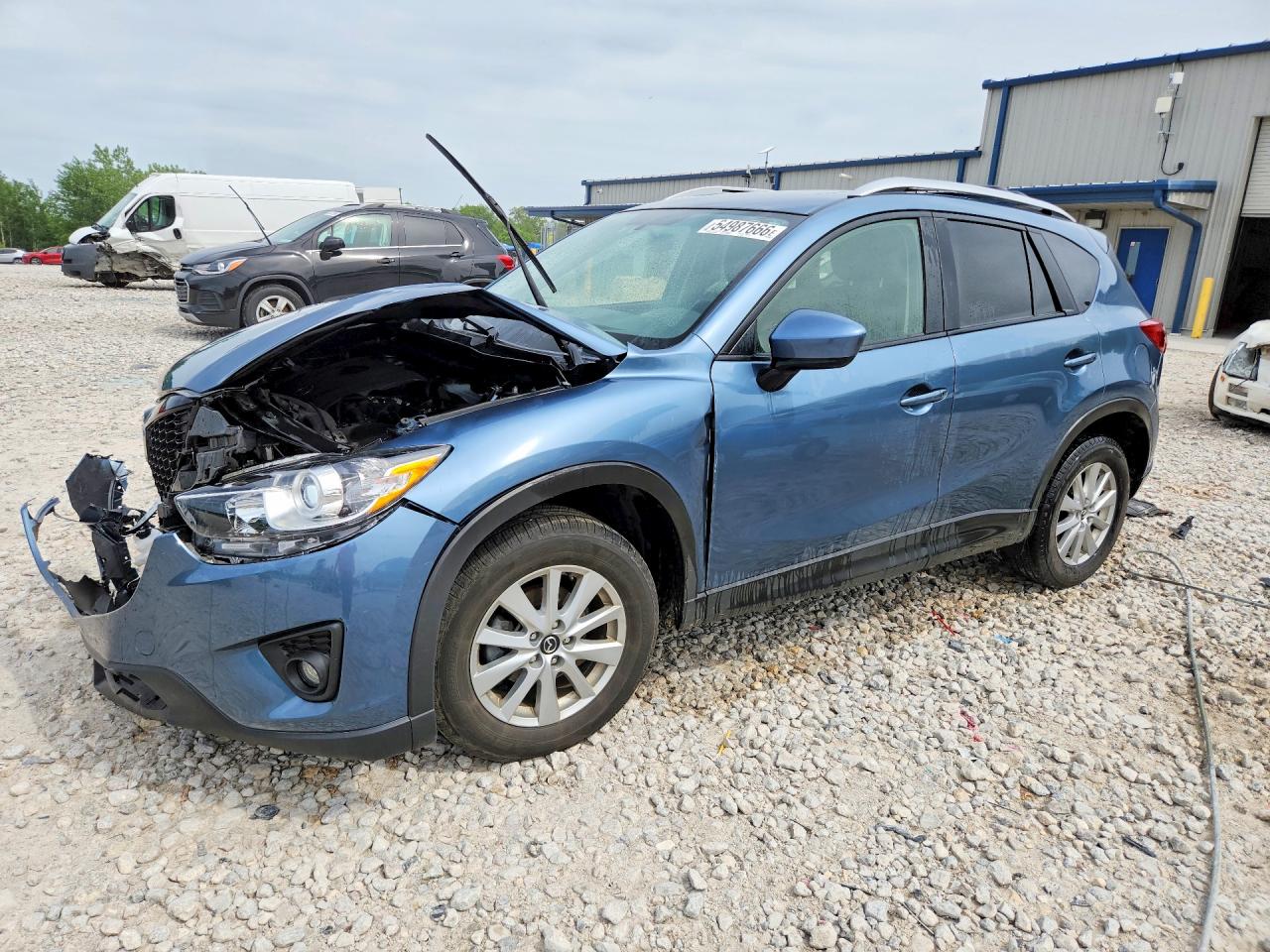 JM3KE4CY1E0403678 · 2014 MAZDA CX-5