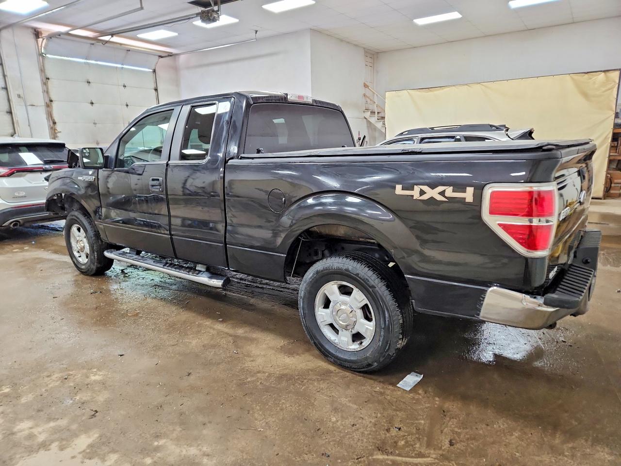 1FTFX1EF4CFD05219 · 2012 FORD F150 · 2/12
