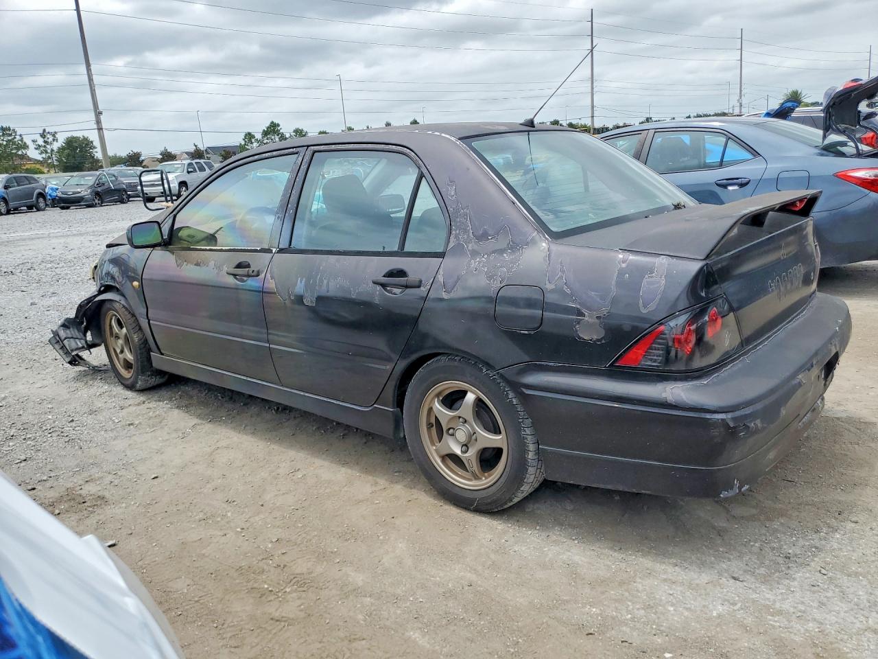 JA3AJ86E92U027064 · 2002 MITSUBISHI LANCER · 2/12