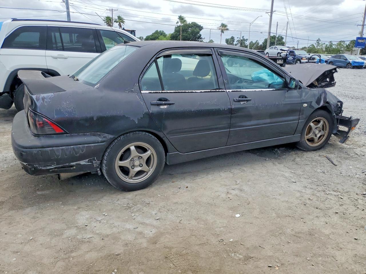 JA3AJ86E92U027064 · 2002 MITSUBISHI LANCER · 3/12