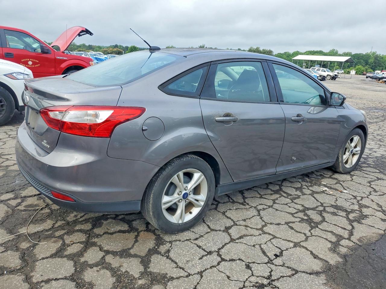 1FADP3F21EL446855 · 2014 FORD FOCUS · 3/12