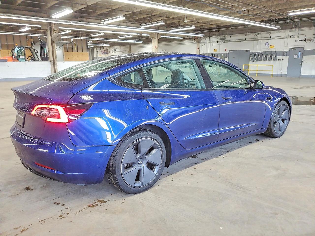 5YJ3E1EA7NF371025 · 2022 TESLA MODEL 3 · 3/12