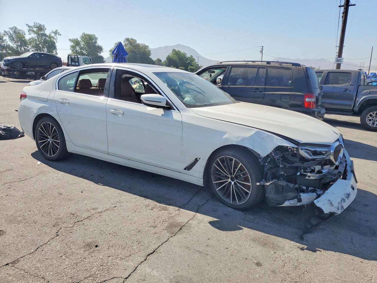 WBA13AG0XMCF03661 · 2021 BMW 530E · 4/12