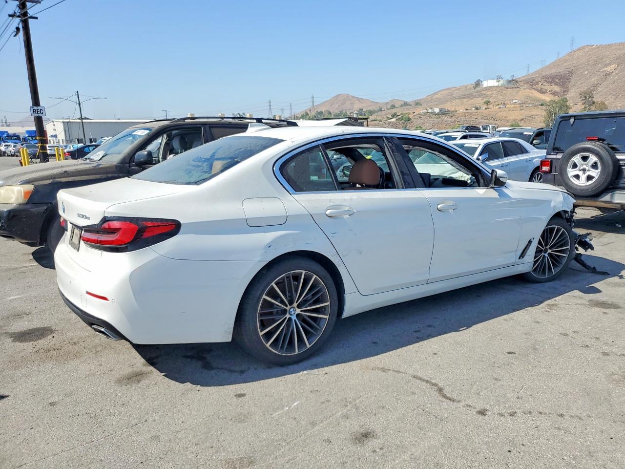 WBA13AG0XMCF03661 · 2021 BMW 530E · 3/12