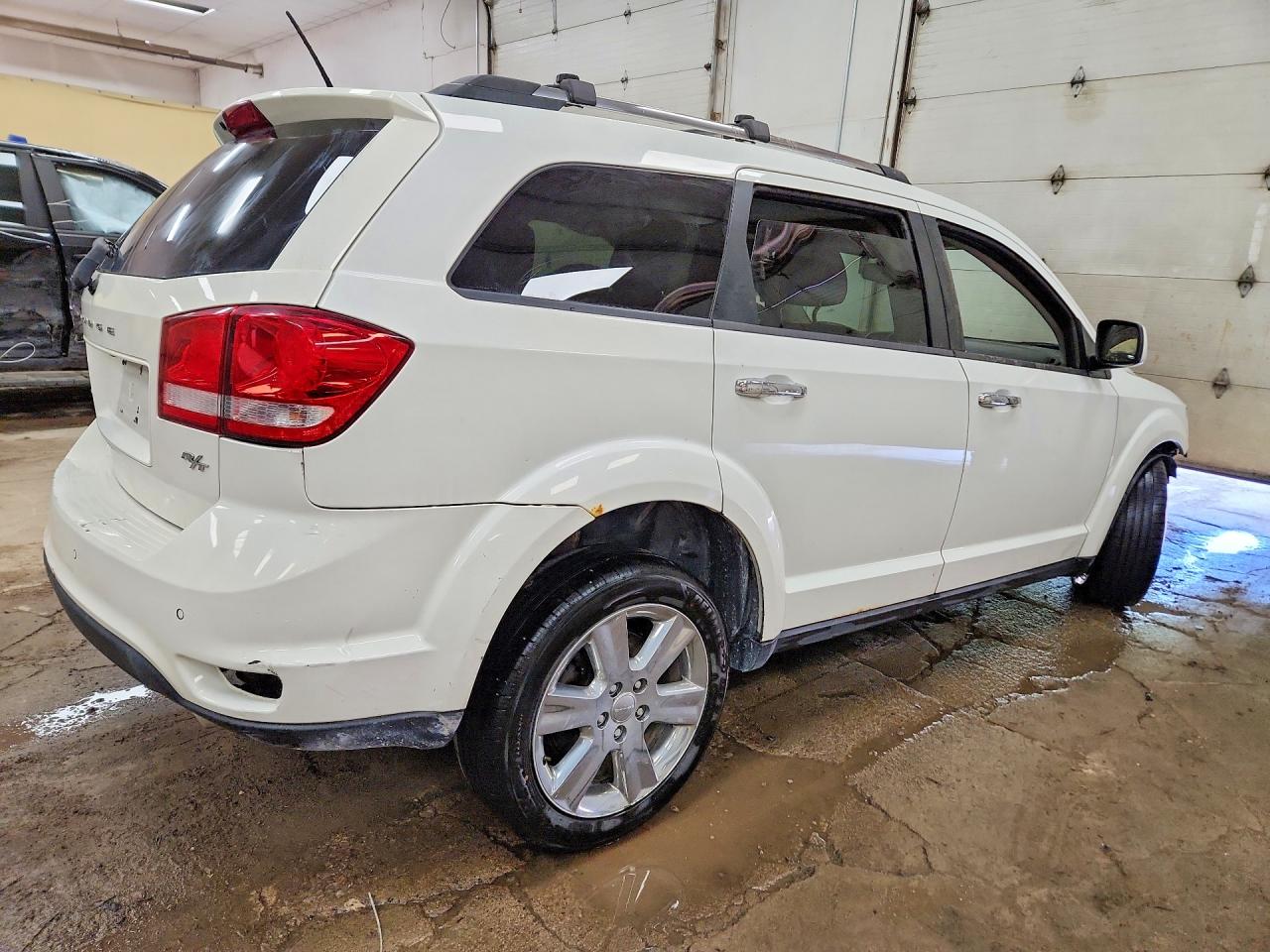 3C4PDDFG1ET237749 · 2014 DODGE JOURNEY · 3/14