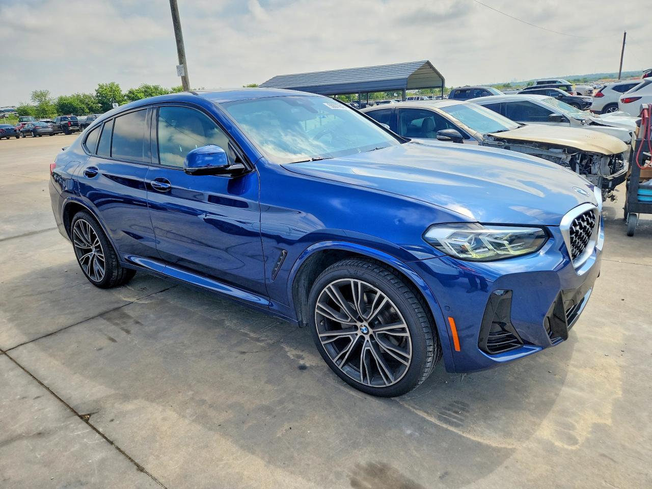 5UX33DT03N9K73863 · 2022 BMW X4 · 4/12