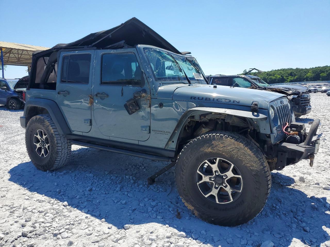 1C4HJWFG2EL120962 · 2014 JEEP WRANGLER UNLIMITED · 4/12