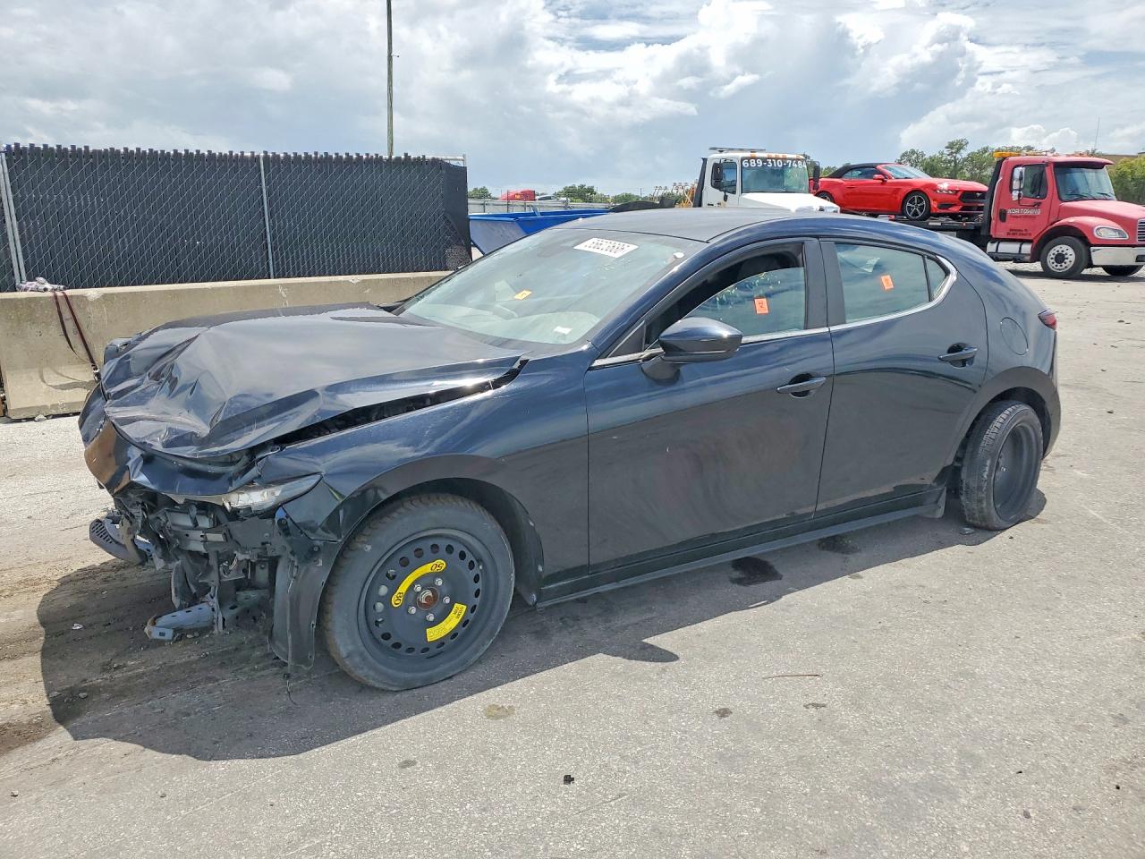 JM1BPAKL2M1336962 · 2021 MAZDA 3