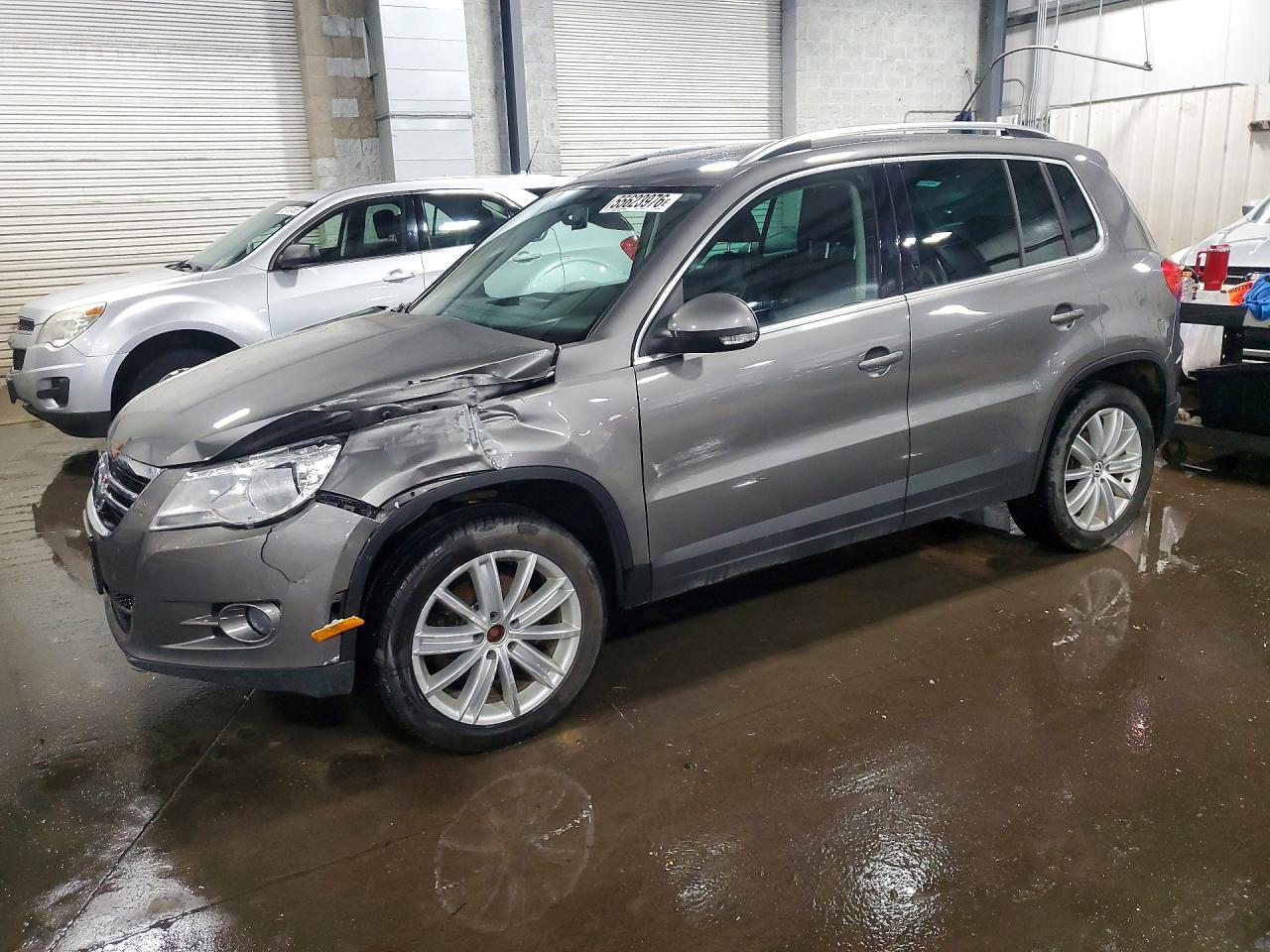 WVGBV7AX9BW538285 · 2011 VOLKSWAGEN TIGUAN