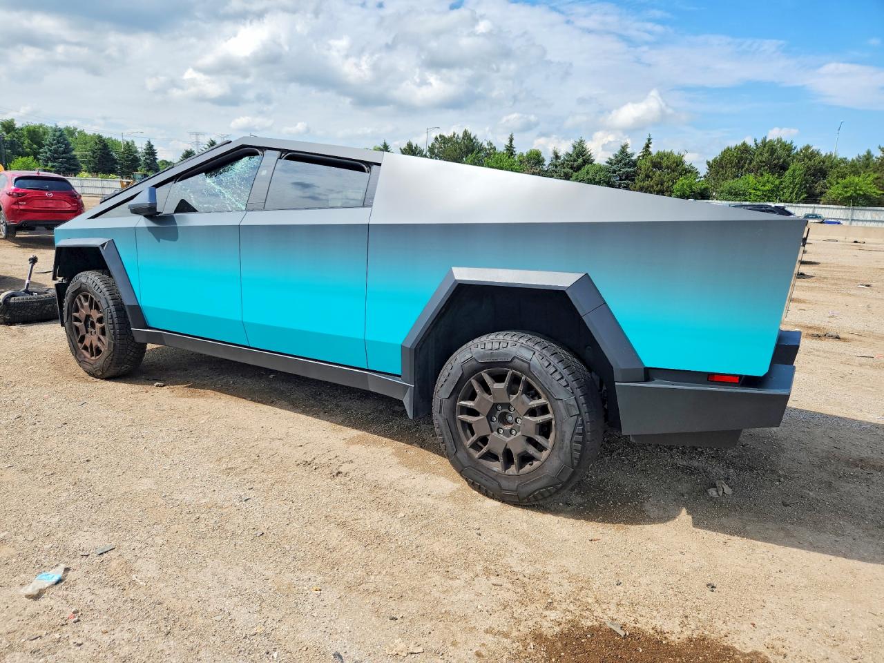 7G2CEHEE5RA056042 · 2024 TESLA CYBERTRUCK · 2/13