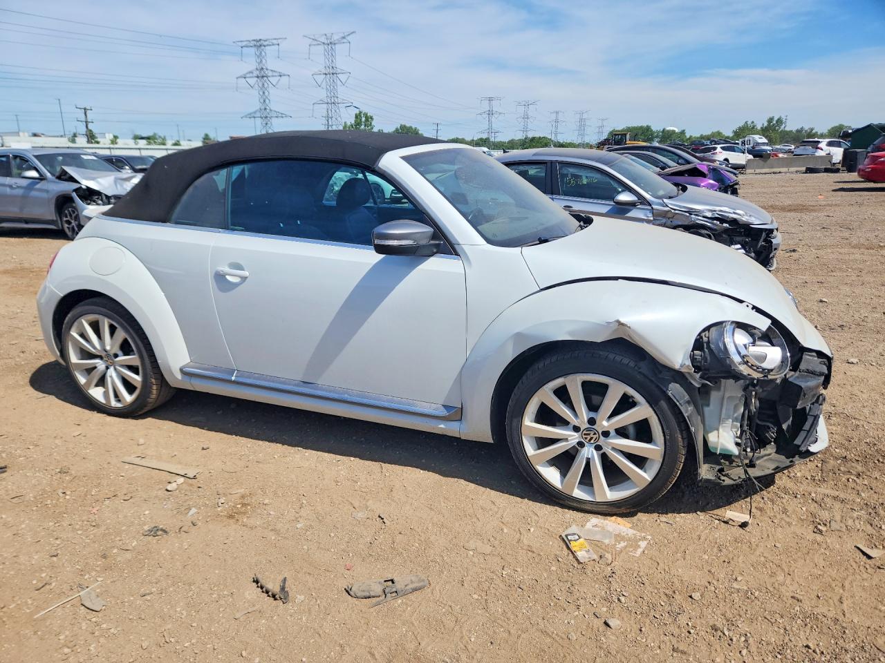 3VW517AT0EM816289 · 2014 VOLKSWAGEN BEETLE · 4/12