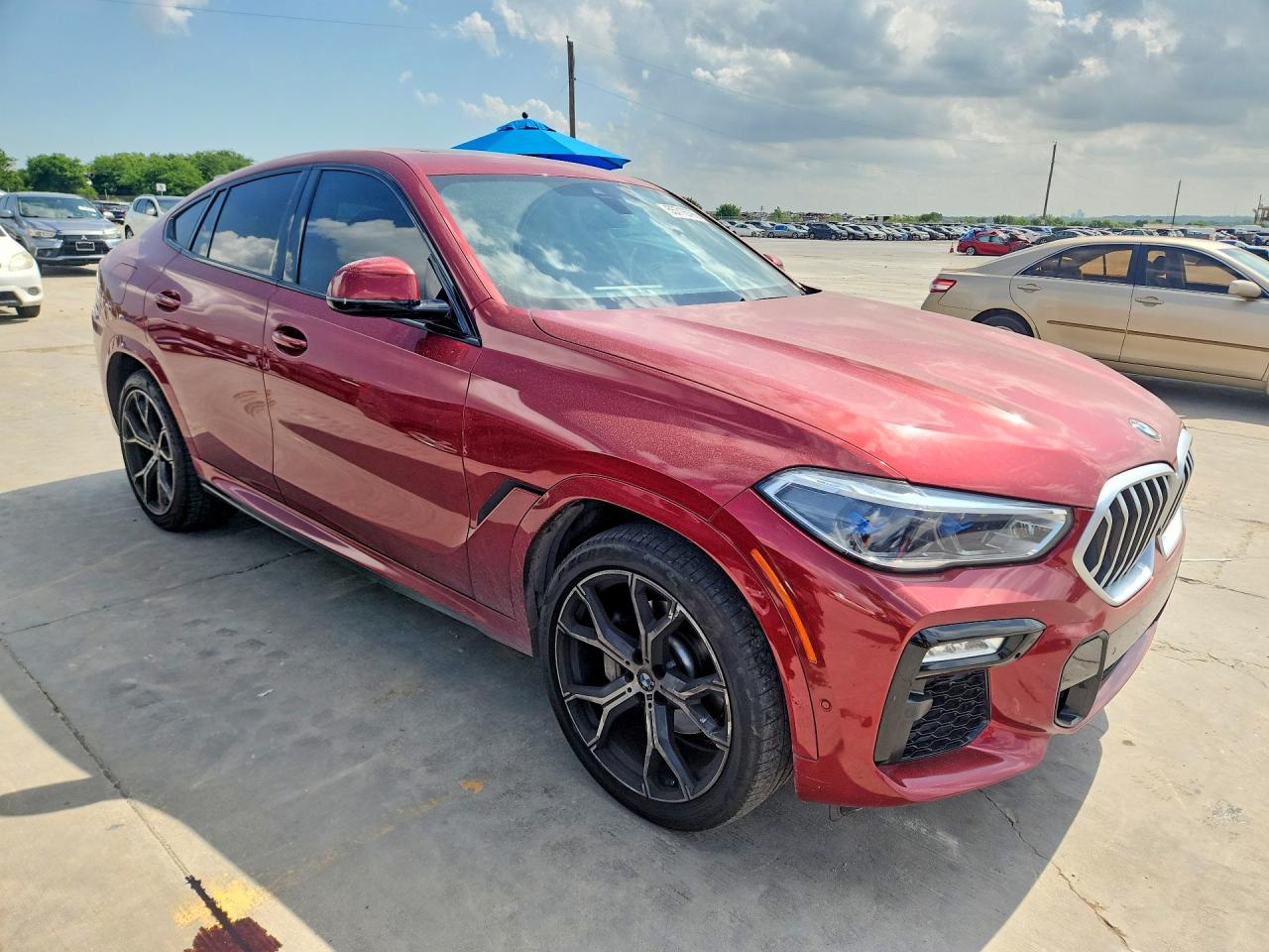5UXCY6C01M9G25210 · 2021 BMW X6 · 4/13