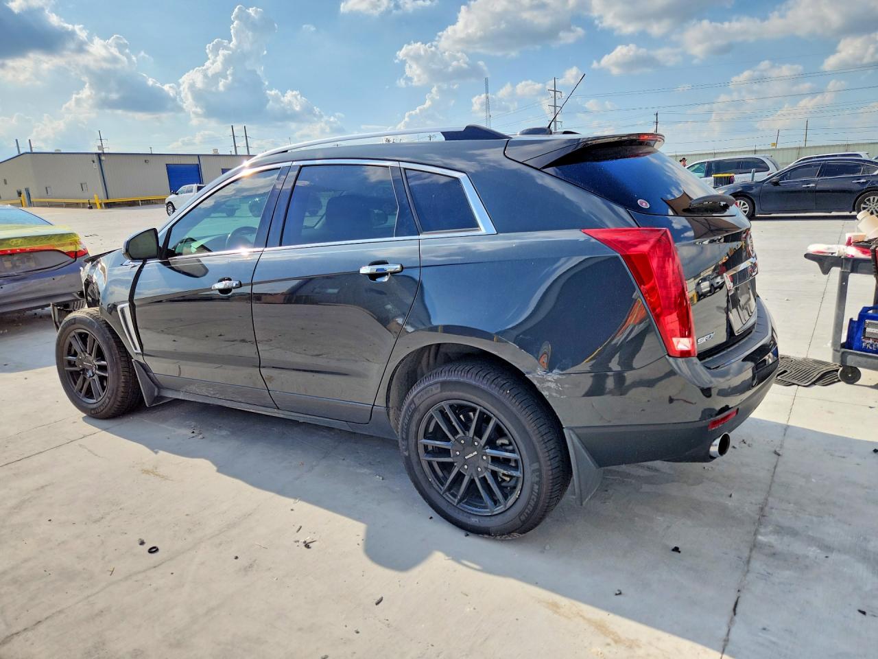 3GYFNDE37FS528605 · 2015 CADILLAC SRX · 2/14