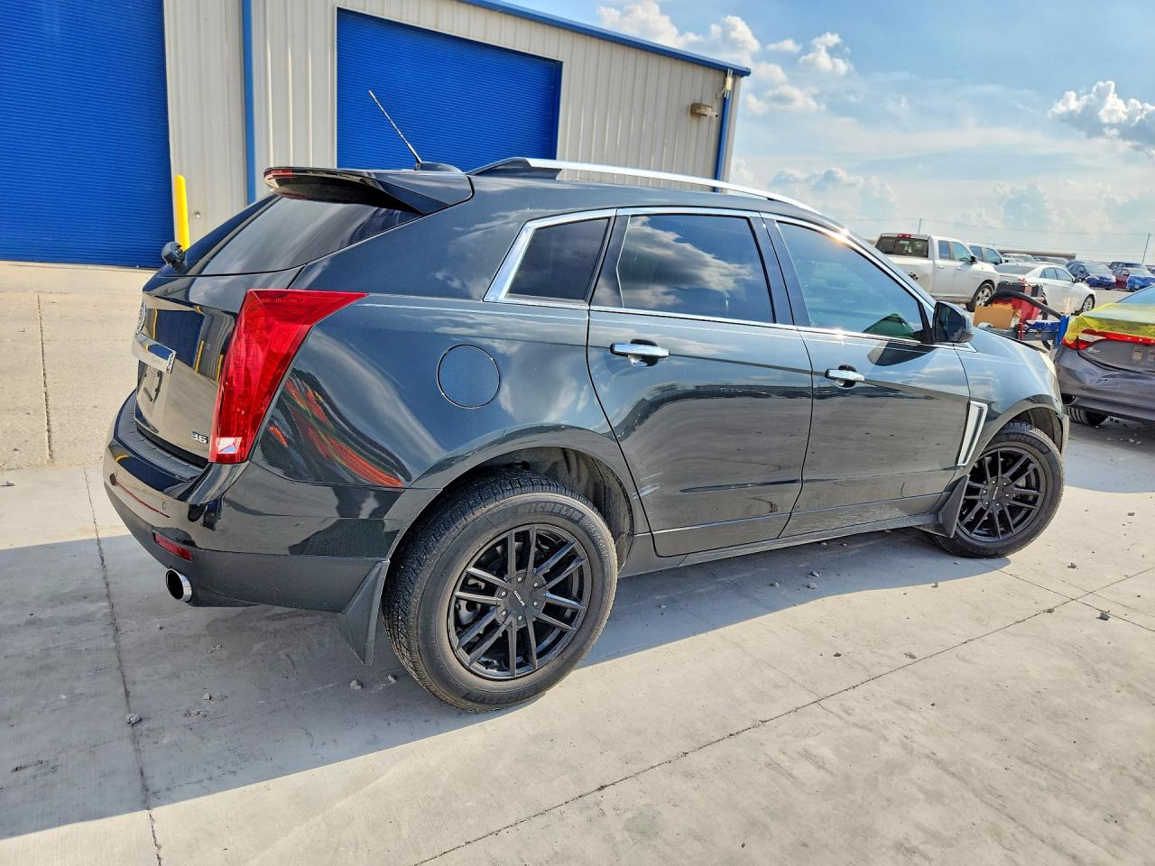 3GYFNDE37FS528605 · 2015 CADILLAC SRX · 3/14