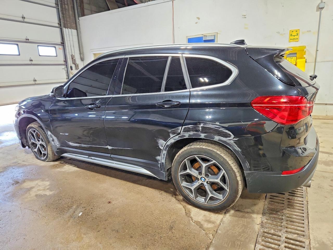 WBXHT3C30H5F86785 · 2017 BMW X1 · 2/13