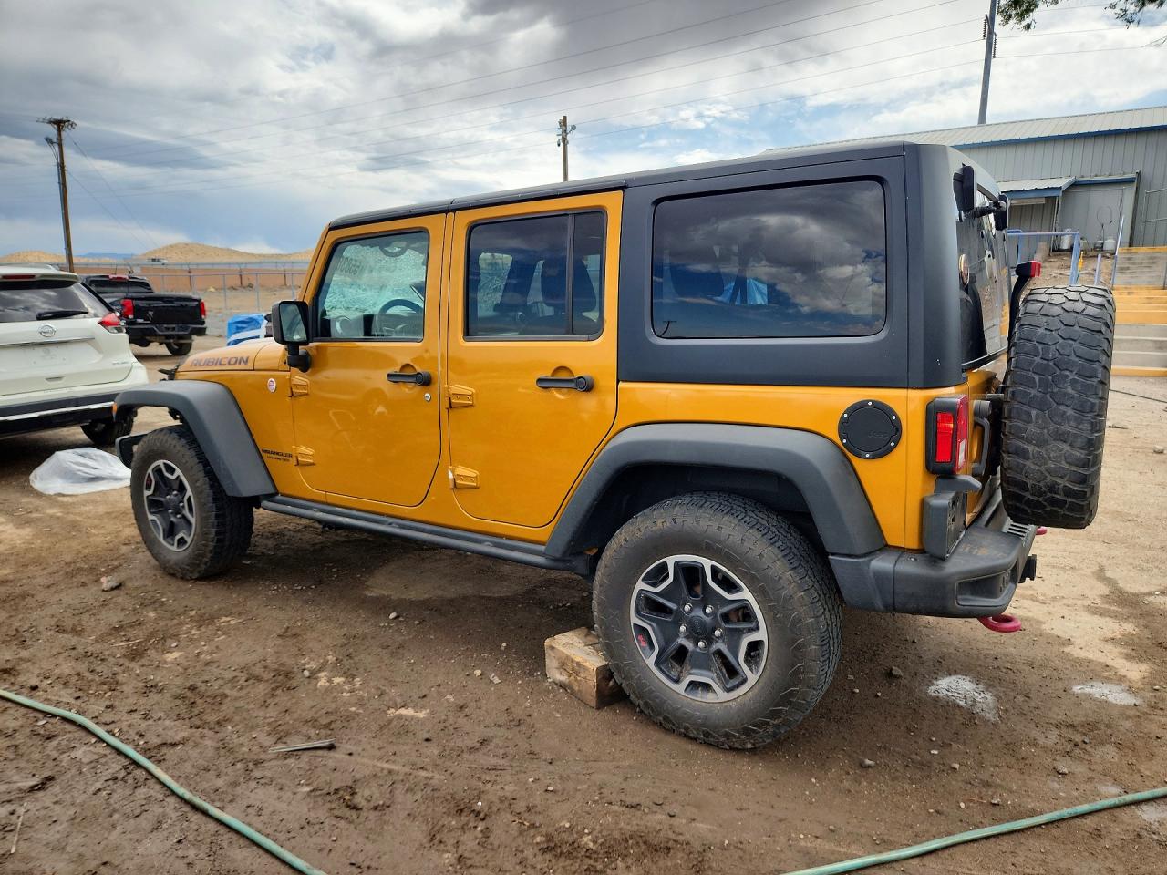 1C4HJWFG0EL302028 · 2014 JEEP WRANGLER UNLIMITED · 2/12
