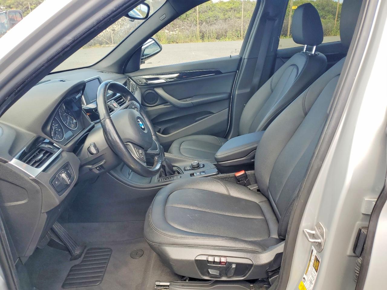WBXHU7C32J5H39726 · 2018 BMW X1 · 7/13