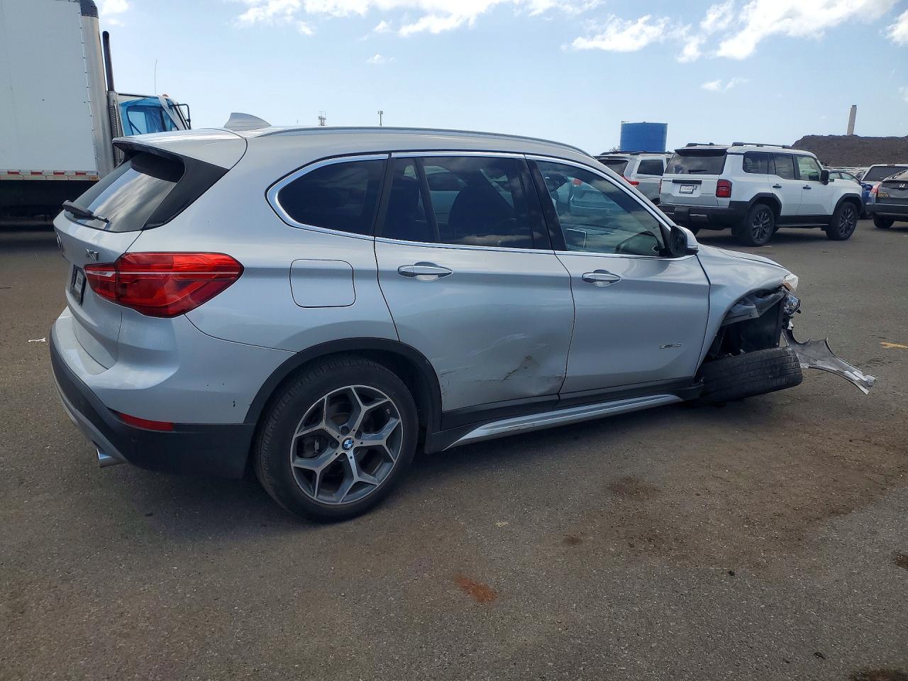 WBXHU7C32J5H39726 · 2018 BMW X1 · 3/13