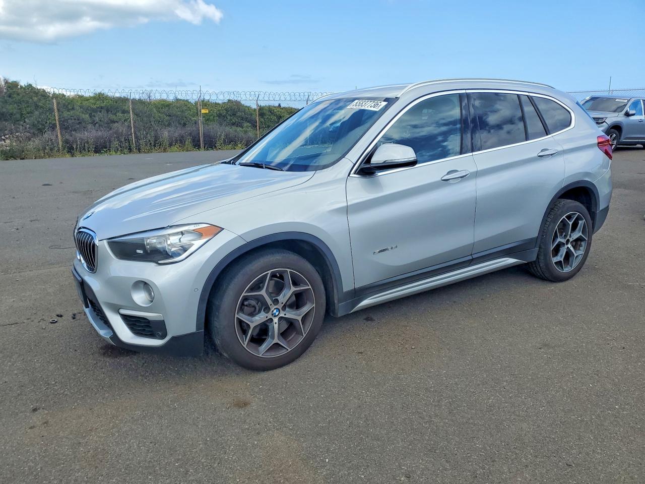 WBXHU7C32J5H39726 · 2018 BMW X1