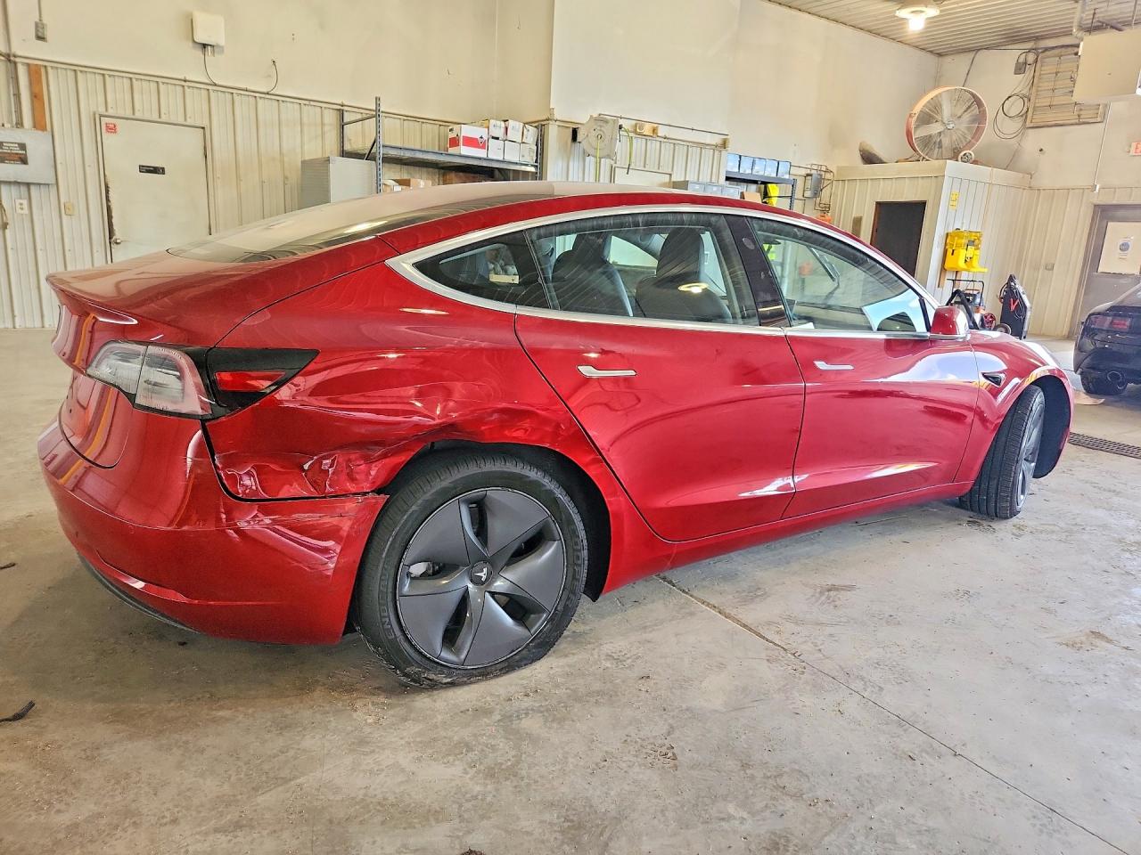 5YJ3E1EA7JF006256 · 2018 TESLA 3 · 3/11