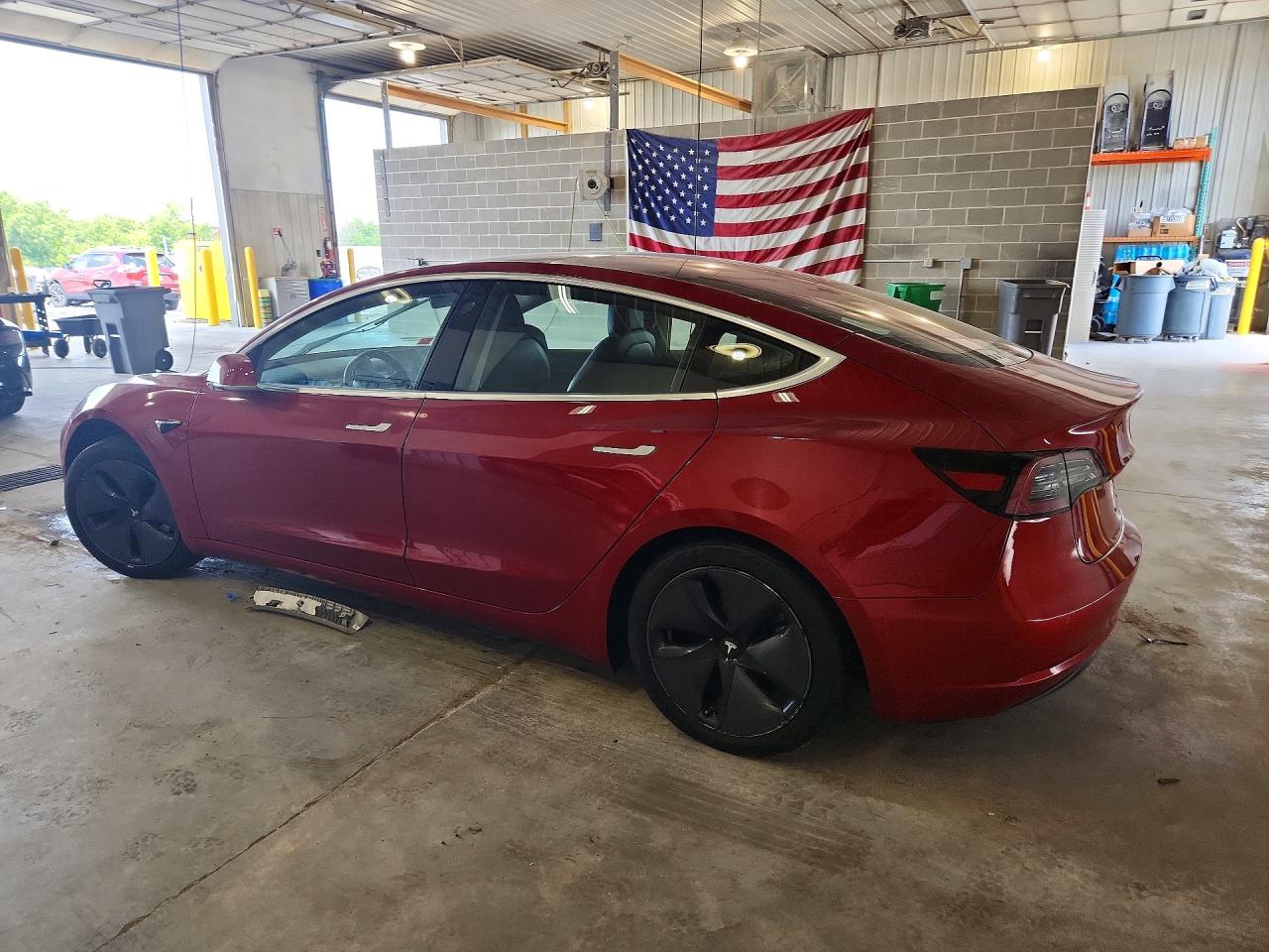 5YJ3E1EA7JF006256 · 2018 TESLA 3 · 2/11