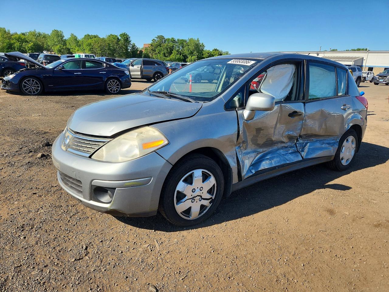 3N1BC13E69L443706 · 2009 NISSAN VERSA