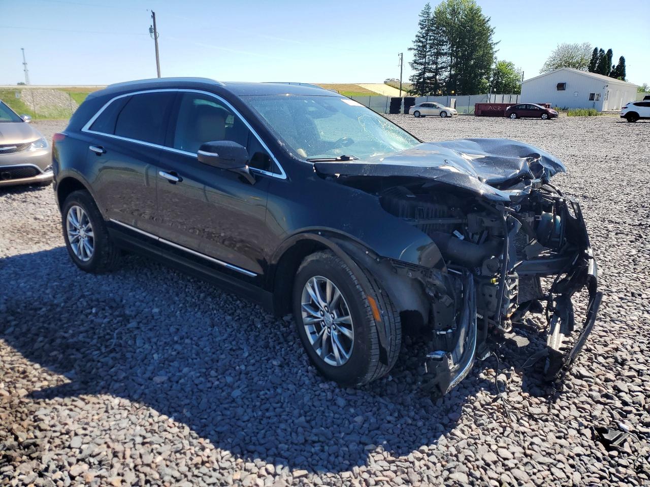 1GYKNDRS2MZ211816 · 2021 CADILLAC XT5 · 4/12