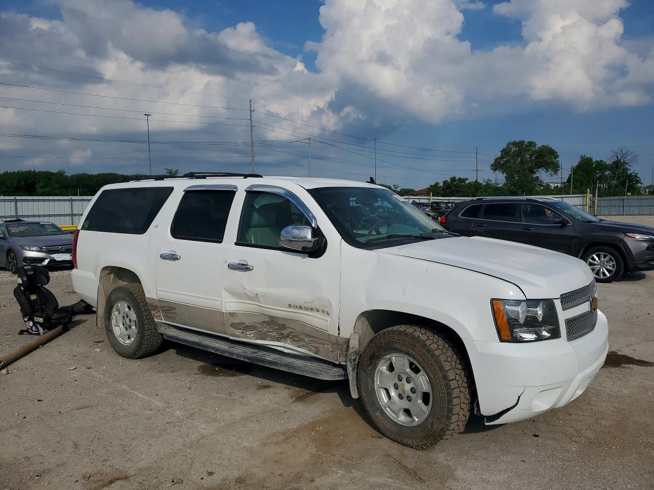1GNSKJE72CR202053 · 2012 CHEVROLET SUBURBAN · 4/13