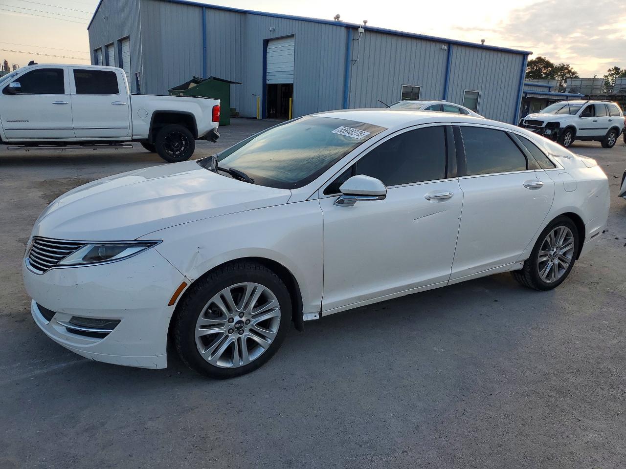 3LN6L2G99GR616965 · 2016 LINCOLN MKZ
