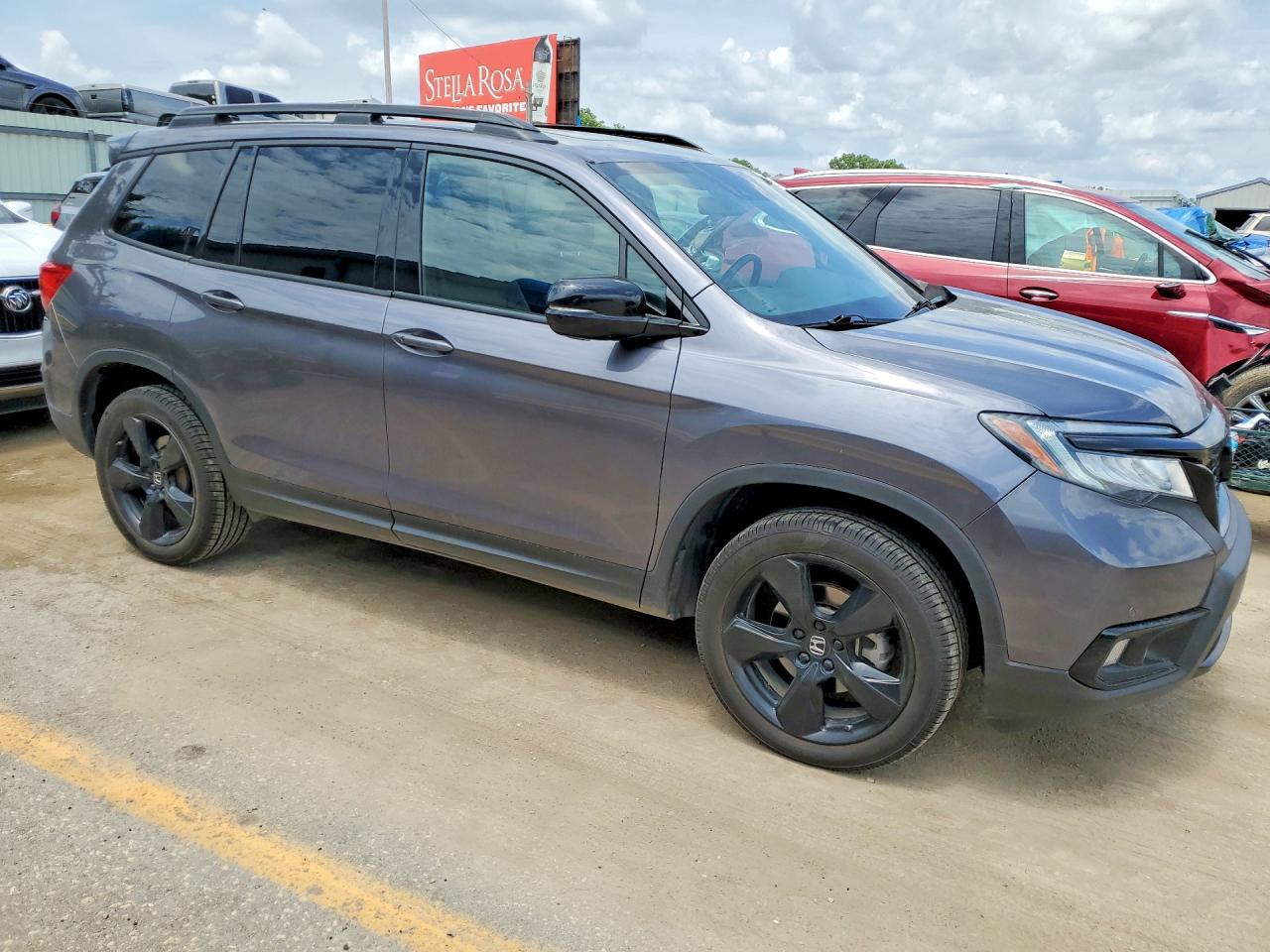 5FNYF8H0XMB024706 · 2021 HONDA PASSPORT · 4/12