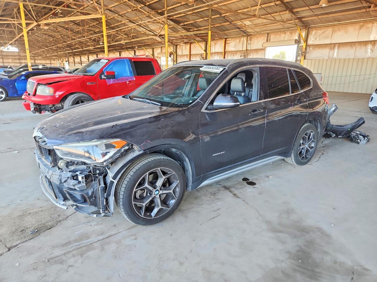 WBXHT3Z36H4A65129 · 2017 BMW X1