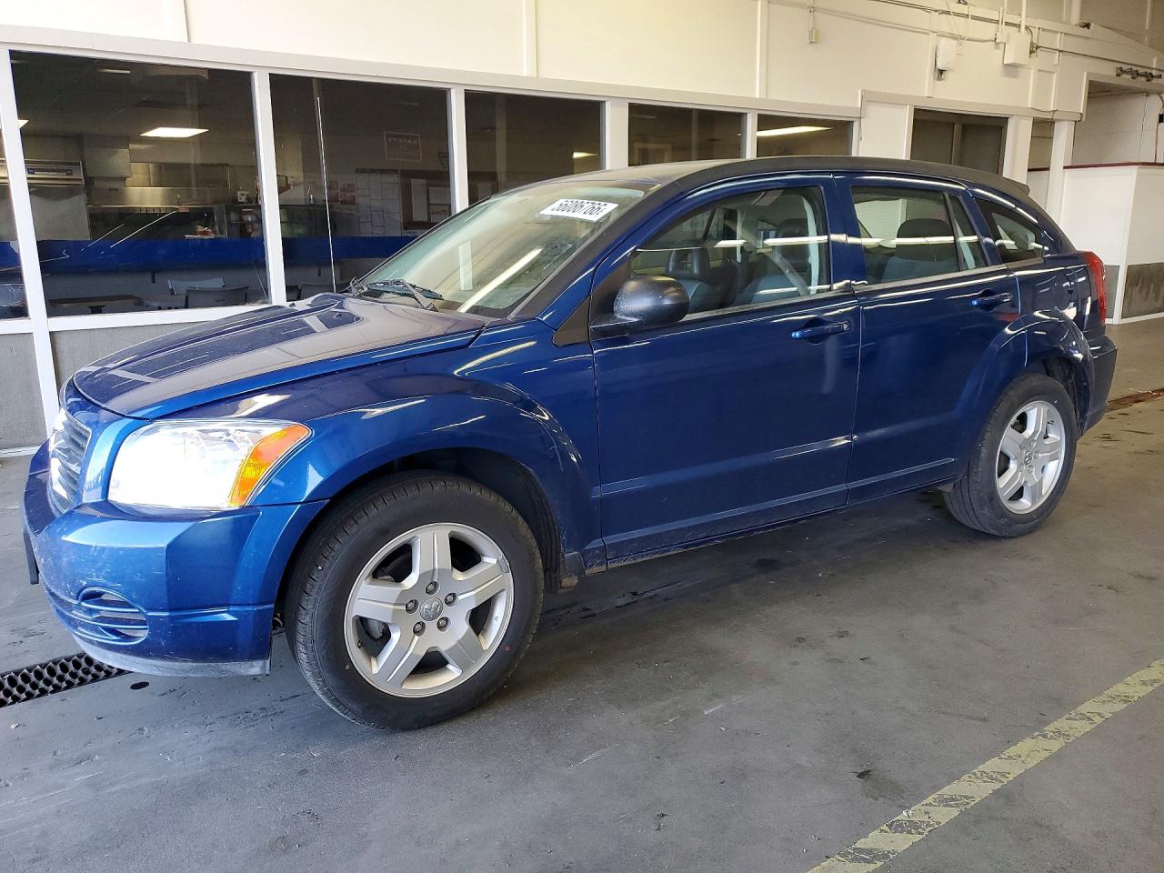 1B3HB48A09D144852 · 2009 DODGE CALIBER