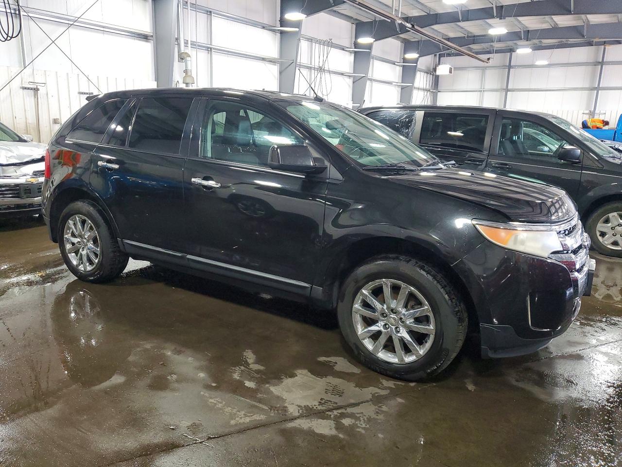 2FMDK4JC6BBA43041 · 2011 FORD EDGE · 4/12