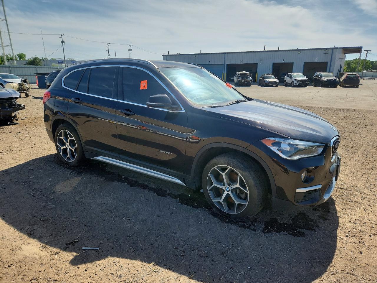 WBXHT3C32H5F70751 · 2017 BMW X1 · 4/13