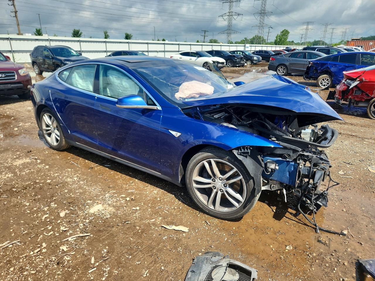 5YJSA1E27FF112004 · 2015 TESLA MODEL S · 4/13