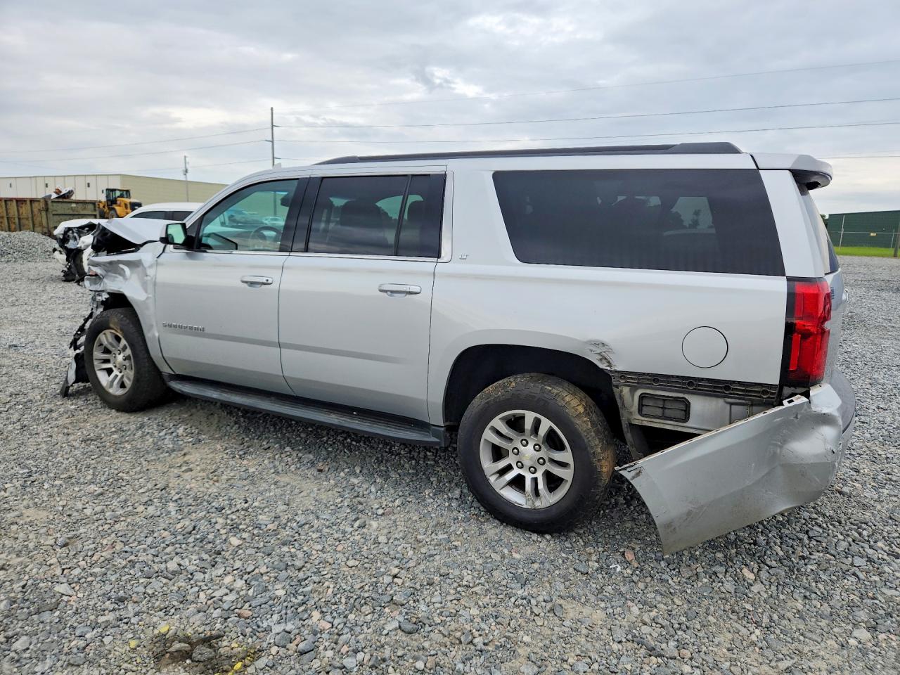 1GNSCHKC7KR313056 · 2019 CHEVROLET SUBURBAN · 2/13