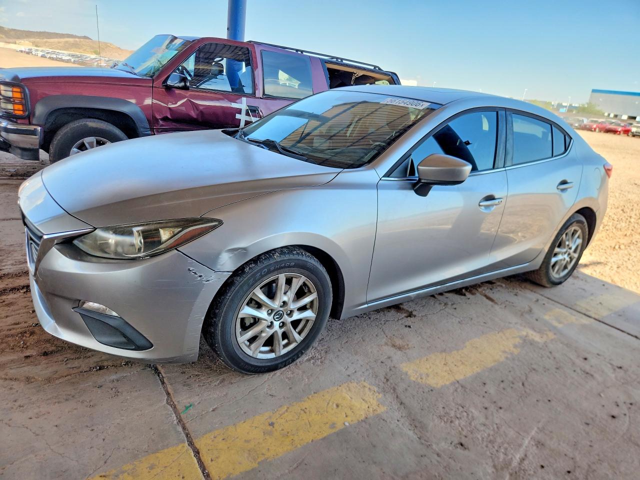 JM1BM1W72E1214495 · 2014 MAZDA 3