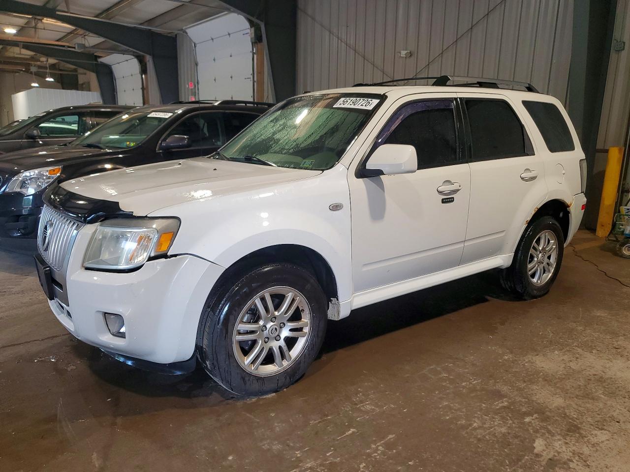 4M2CU87G39KJ06117 · 2009 MERCURY MARINER