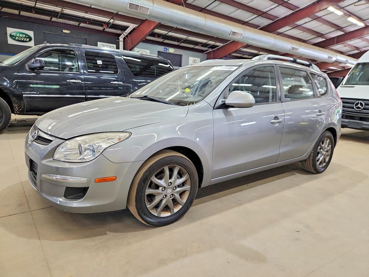 KMHDC8AE1CU152928 · 2012 HYUNDAI ELANTRA TOURING