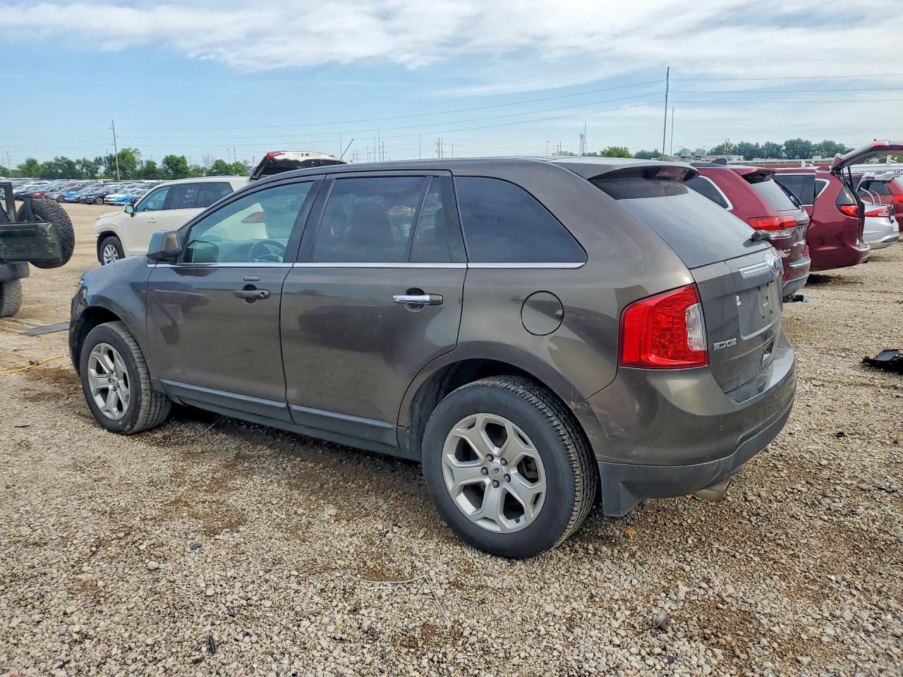 2FMDK4KC1BBA05442 · 2011 FORD EDGE · 2/13