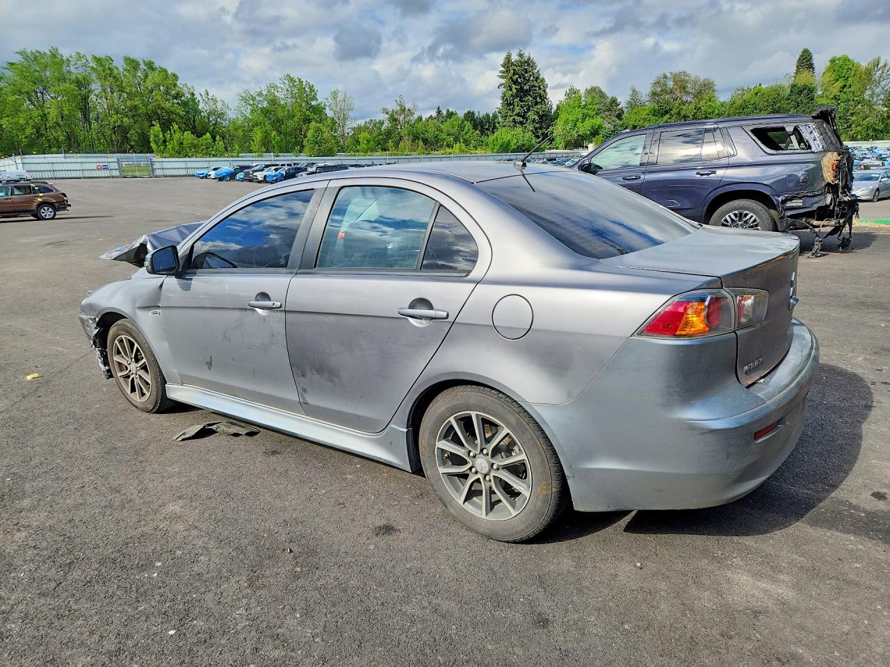 JA32U2FU6HU005127 · 2017 MITSUBISHI LANCER · 2/12