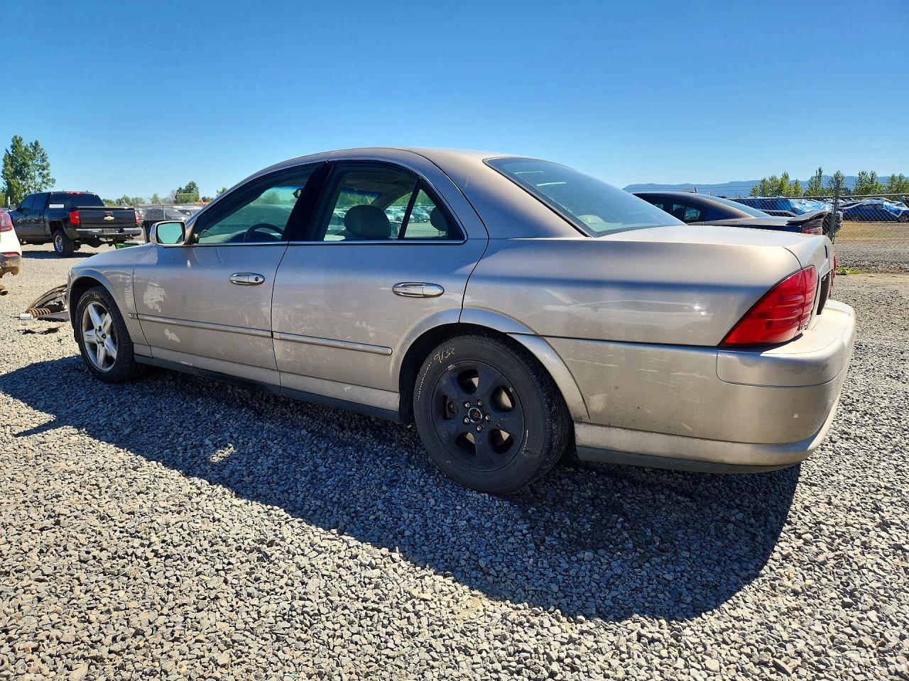 1LNHM87A0YY904864 · 2000 LINCOLN LS · 2/12