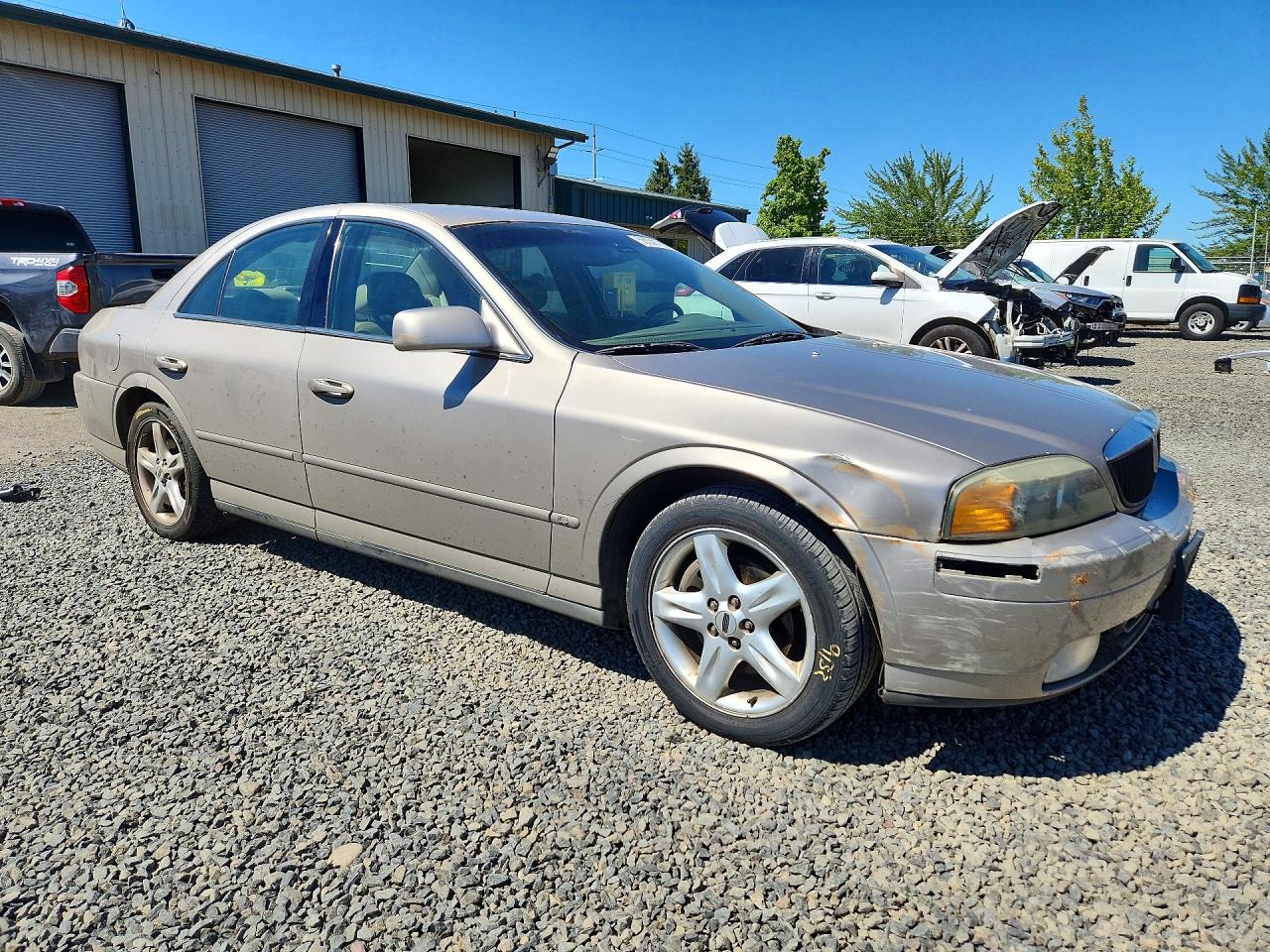 1LNHM87A0YY904864 · 2000 LINCOLN LS · 4/12