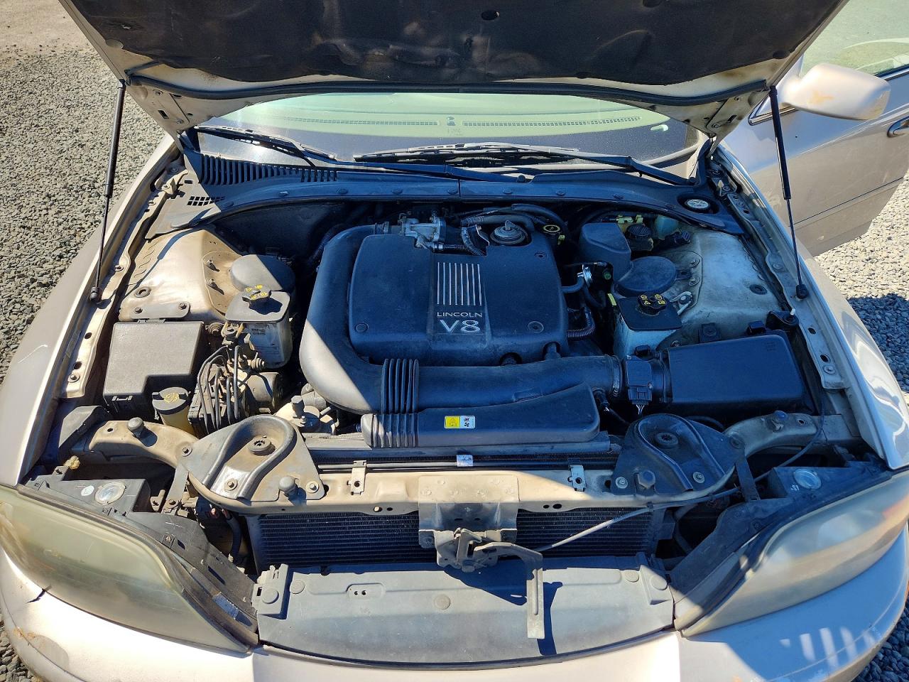 1LNHM87A0YY904864 · 2000 LINCOLN LS · 11/12