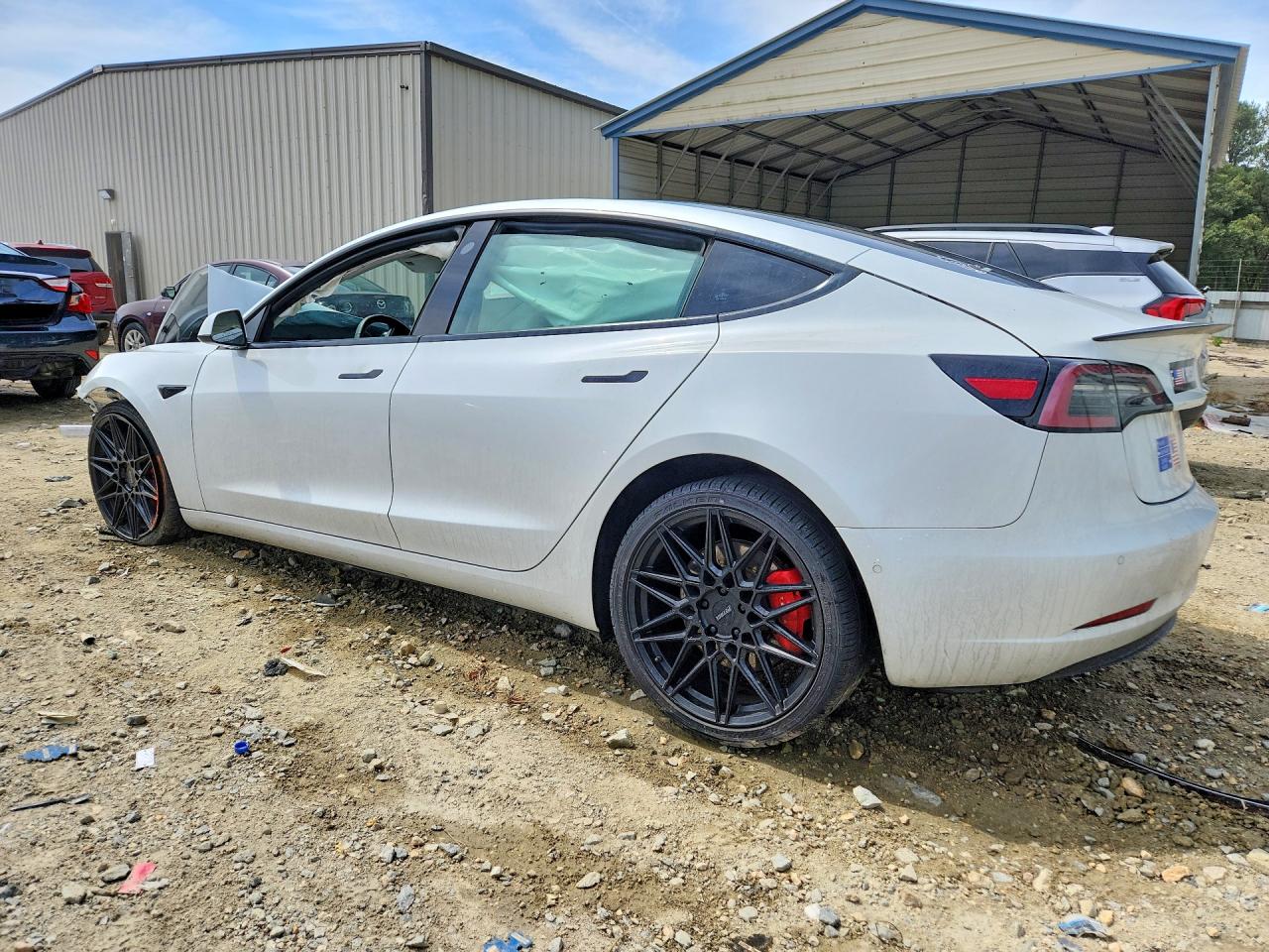 5YJ3E1EC4MF033243 · 2021 TESLA MODEL 3 · 2/12