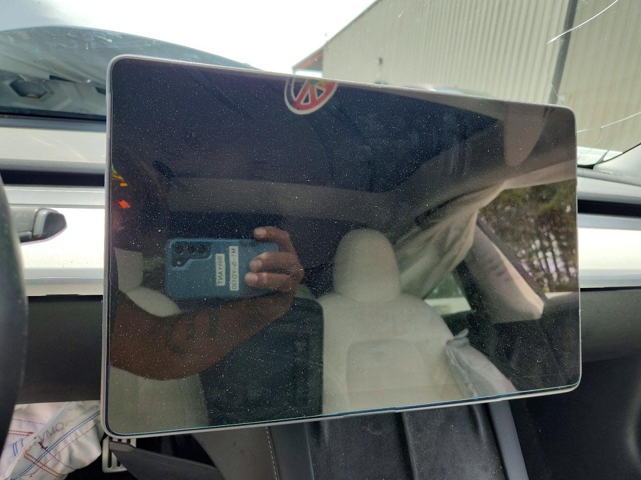 5YJ3E1EC4MF033243 · 2021 TESLA MODEL 3 · 9/12