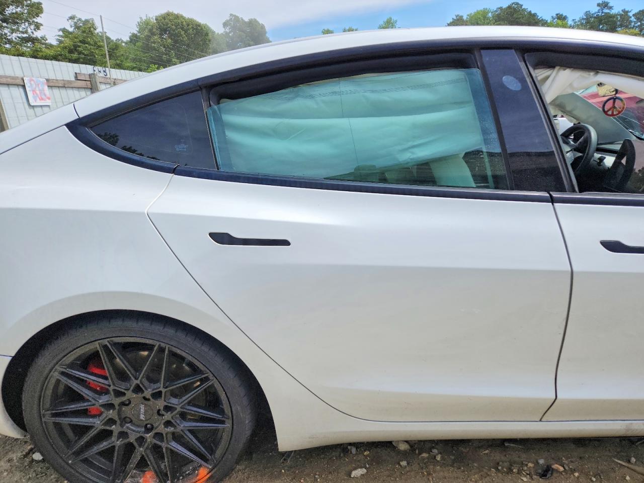 5YJ3E1EC4MF033243 · 2021 TESLA MODEL 3 · 10/12