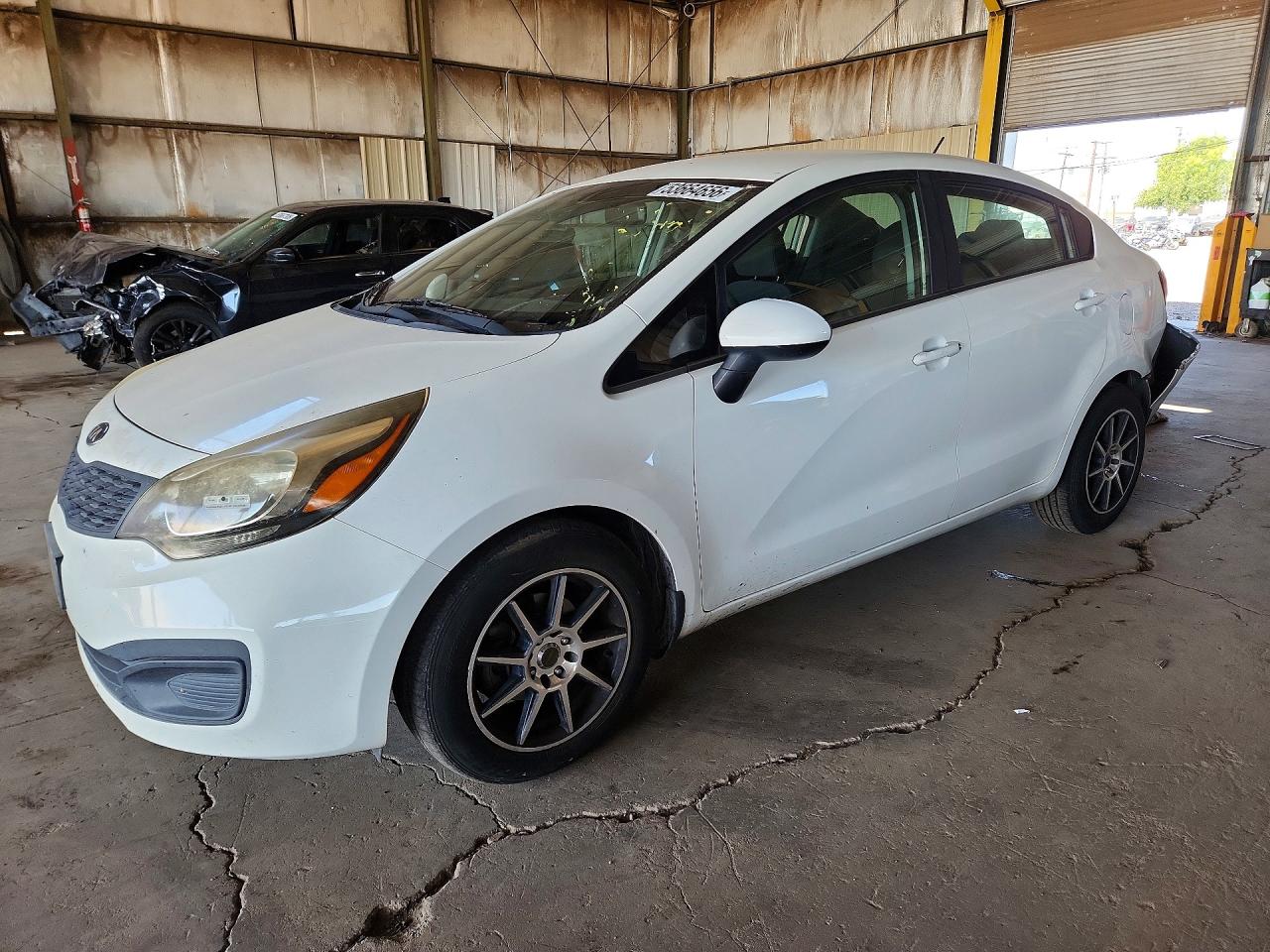 KNADM4A33D6292846 · 2013 KIA RIO