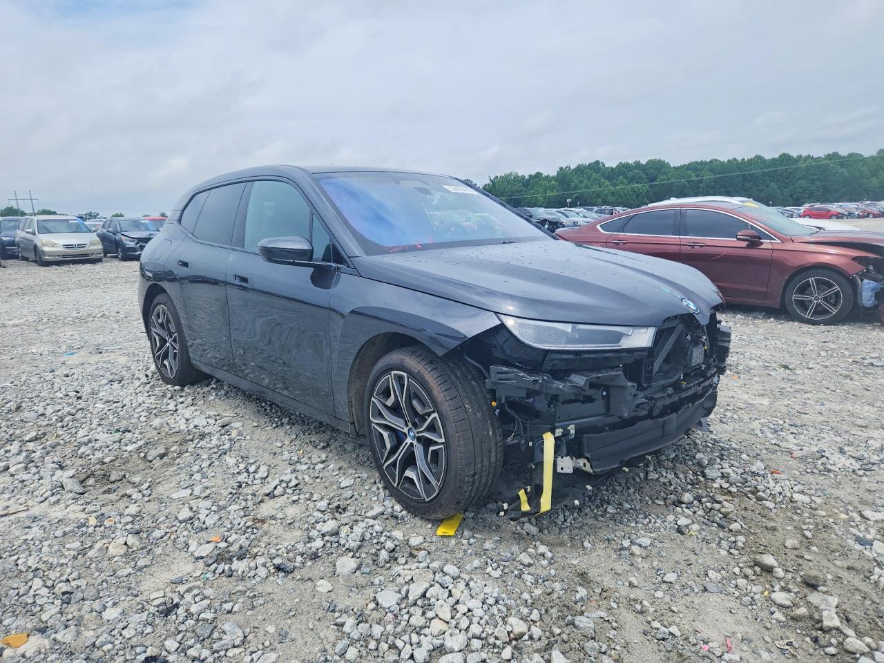 WB523CF04SCU06952 · 2025 BMW IX · 4/14