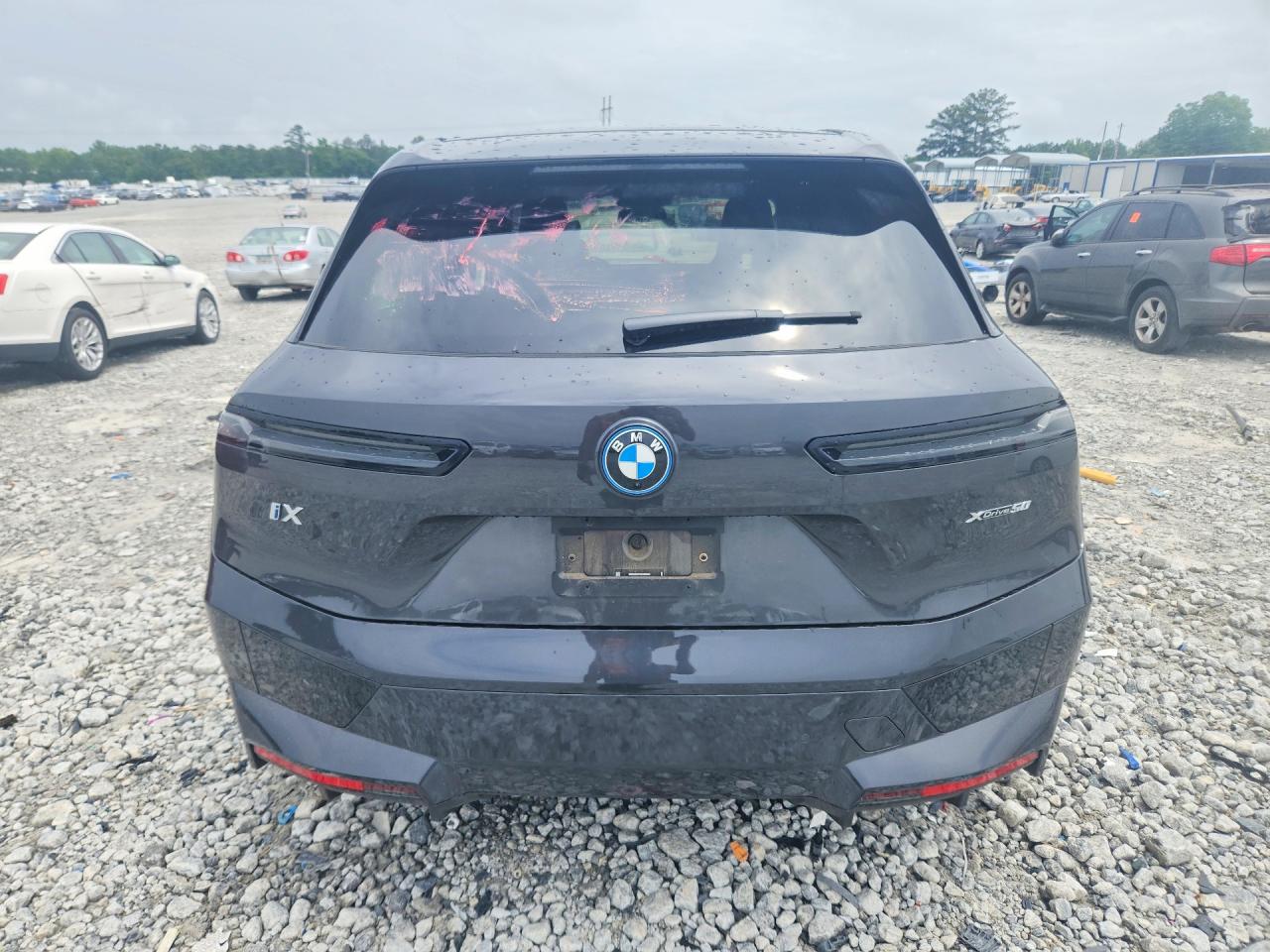 WB523CF04SCU06952 · 2025 BMW IX · 6/14